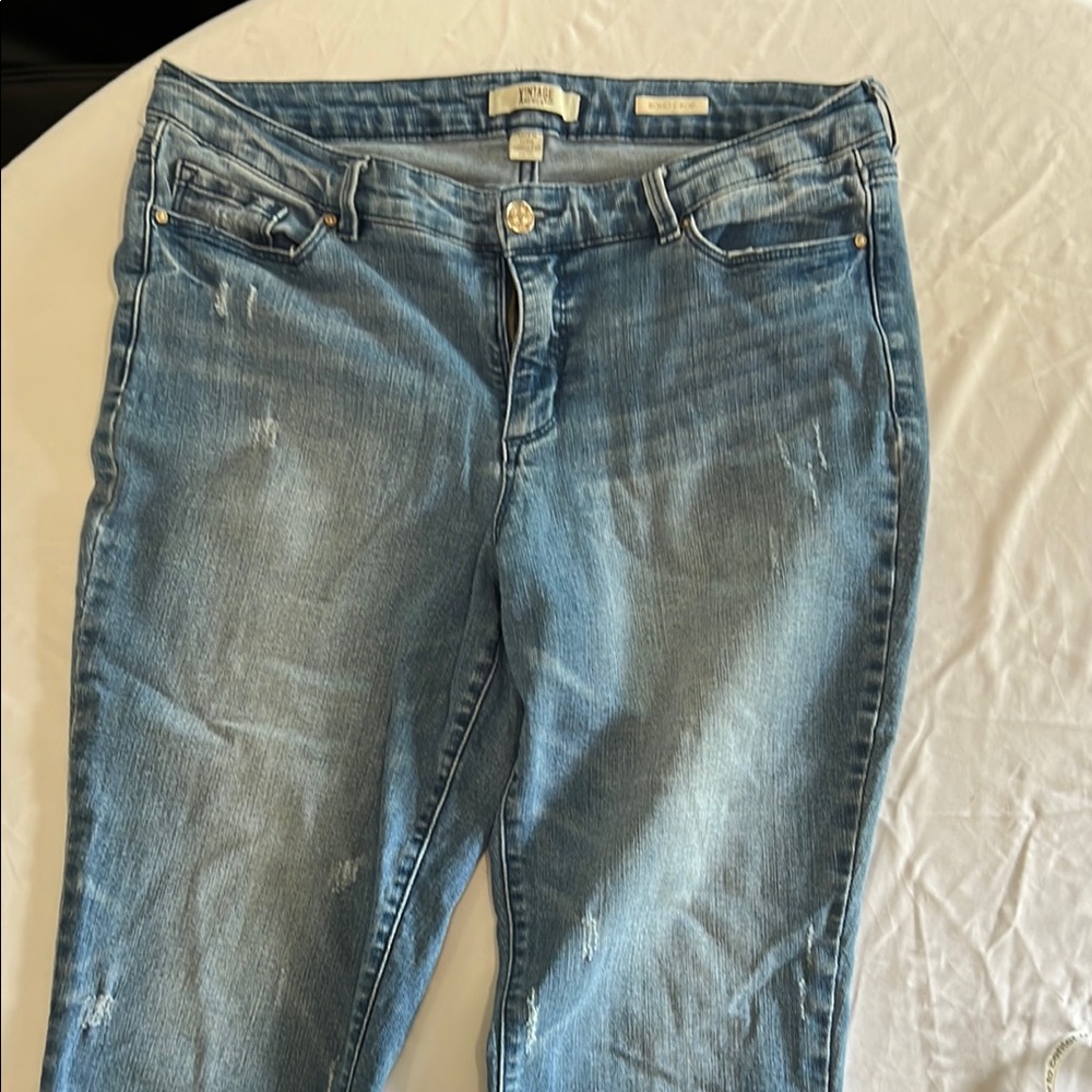 Classic Blue Straight Leg Jeans with Distressed Details